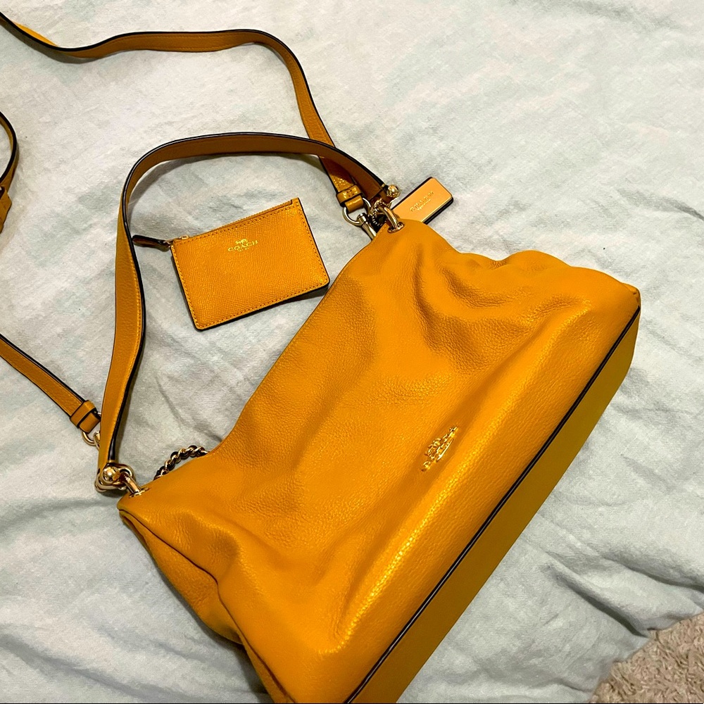 Mustard yellow coach hand bag with wallet